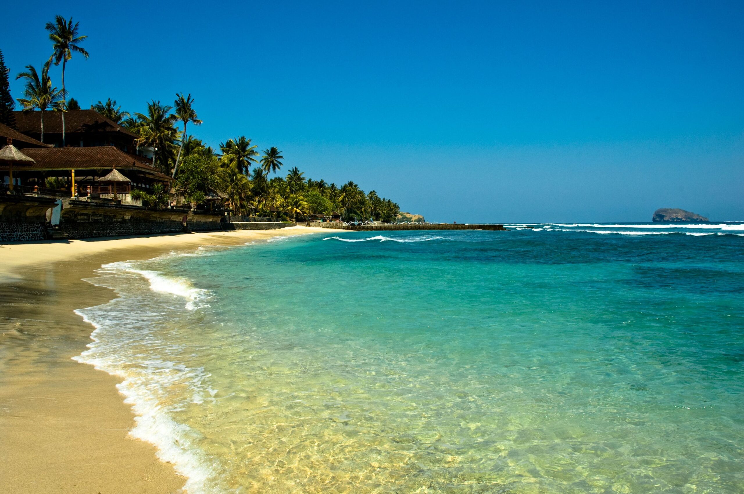 Candidasa Bali Lotus Lagoon peaceful fishing village East Bali temple view